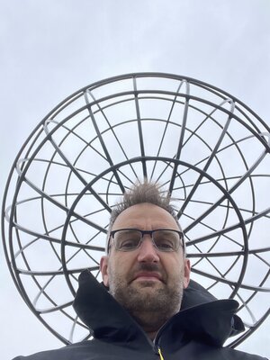 Paul at the iron globe at Nordkapp