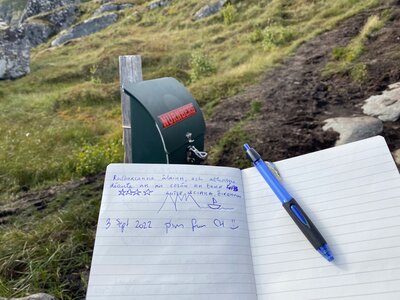 A cute logbook halfway up the trail, signed with Pim from CH